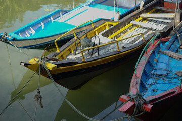 Fototapeta na wymiar Some fisherman boat in the bay