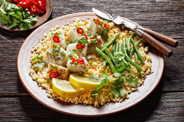 cod with bulgur, steamed green beans, top view