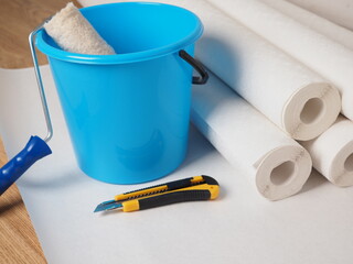 Wallpapering, glue bucket, repair tool