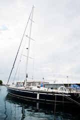 Fototapeta premium Marine parking of modern motor boats. Luxury yachts docked in sea port.