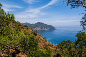 Fototapeta na wymiar Picturesque landscape of Maden Bay near Cirali from lycian trail, Kemer, Antalya. May 2021, long exposure picture