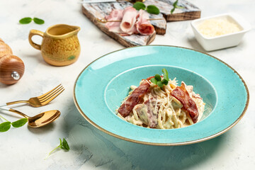 Spaghetti carbonara, italian pasta with bacon and cream sauce. Restaurant menu, dieting, cookbook recipe