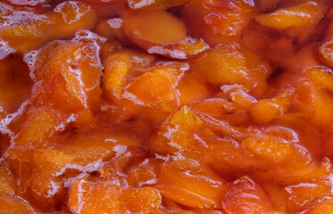 Making jam from ripe juicy sweet peach