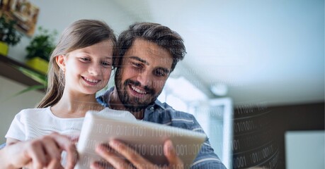 Binary coding data processing against caucasian father and daughter using digital tablet at home