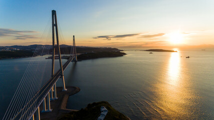 Russian bridge across the Eastern Bosphorus Strait in Vladivostok. View from above. Russian bridge...