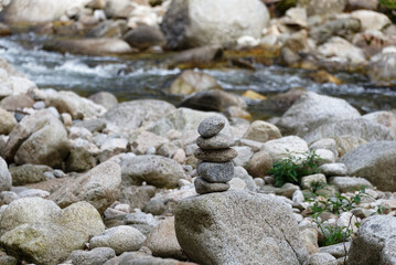 Stones are piled on top of each other to show the way
