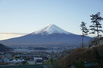 Fototapeta na wymiar Mount Fuji near lake Kawaguchiko in the morning, Fuji mountain the highest volcano in Japan.