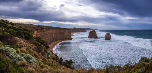 Silver rays of the moon light. Wide panorama at night Twelve Apostles Sea Rocks near Great Ocean...