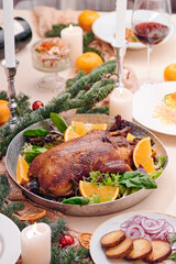Christmas Roast duck on the holiday table. Space for text. High quality photo