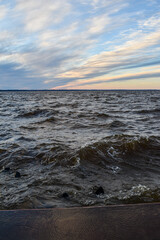 beautiful sunset and waves on the Volga River