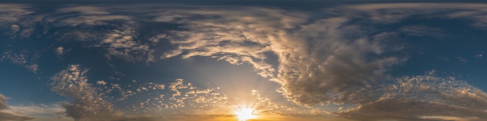 Dark blue sunset sky pano with Cumulus clouds. Seamless hdr panorama in spherical equirectangular format. Complete zenith for 3D visualization, game and sky replacement for aerial drone 360 panoramas.