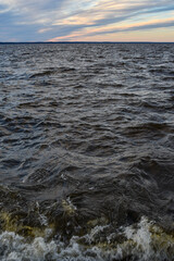 beautiful sunset and waves on the Volga River