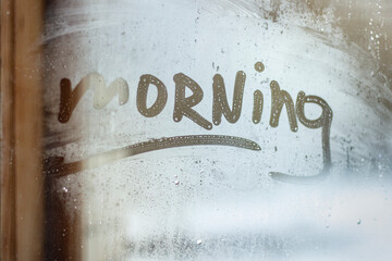 hand drawn letters on the window, good morning inscription