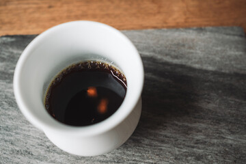 barista dripping coffee and slow coffee bar style