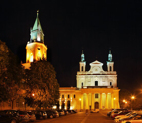 Fototapeta na wymiar Cathedral of St. John the Baptist and Trinity (Trynitarska) tower in Lublin. Poland