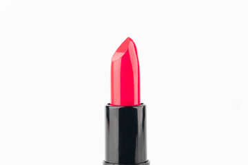 Obraz premium Red lipsticks in black tube package isolated on white background. Makeup and cosmetics concept. Close up.