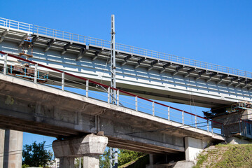 Fototapeta na wymiar Road construction Highway overpass bridge concrete structure in city