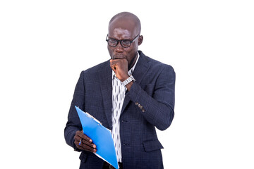 portrait of a young bearded businessman holding a folder, yawning.