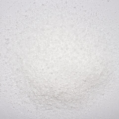 Citric acid white background.Citric acid crystal top view.