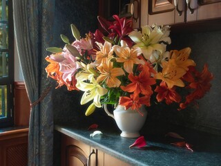 Still life with a luxurious bouquet of garden lilies