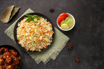 Chinese fried rice and chilly chicken curry Chicken fried rice with vegetables fried eggs basmati grain very popular food in restaurants Kerala Mumbai India Sri Lanka china