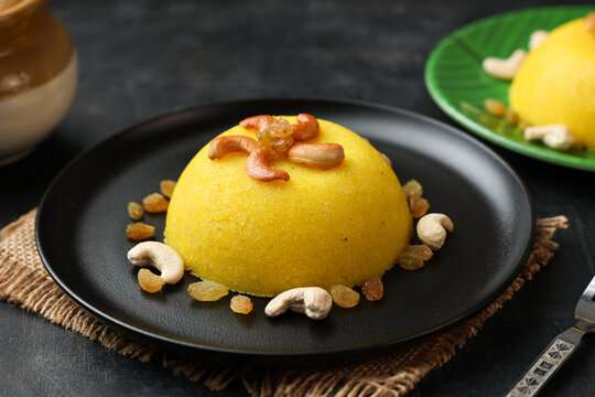 Rava kesari , Kesari bath , sheera or suji halwa  Indian sweet  food.mithai for Diwali ,pongal,  ugadi in Karnataka, Tamil Nadu , south Indian , North Indian, Sri Lanka Semolina pudding dessert