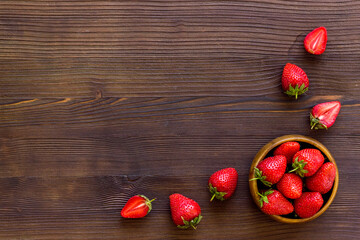 Strawberry flat lay - berries in bowl top view