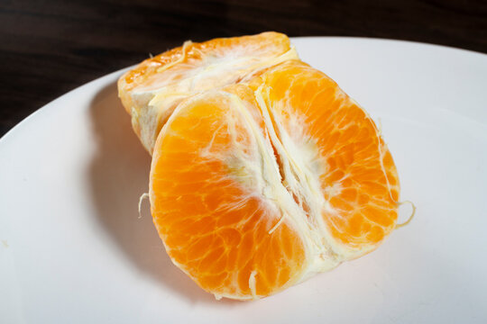 Fresh tangerine murcott on the table. Selective focus.