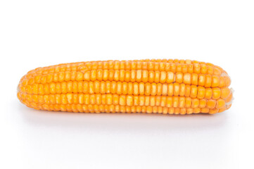 Beautiful ripe yellow dried corn on a white background.  Dried corn for animals.  Dried corn seeds. 