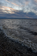 beautiful sunset and waves on the Volga River