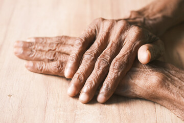 Fototapeta premium close up of hands of a elderly person 