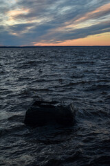 Obraz premium beautiful sunset and waves on the Volga River