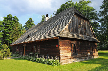 Fototapeta na wymiar Wooden house dating back to 1831 in Kielcza in south-western Poland.