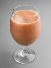 Cold smoothie with strawberries in a glass