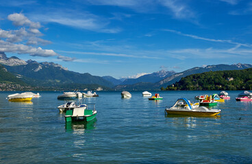 Fototapeta na wymiar Boats on Annecy lake on a sunny day, France