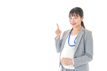 指をさす妊娠中のビジネスウーマン