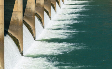 water released from hydroelectric power station. - obrazy, fototapety, plakaty