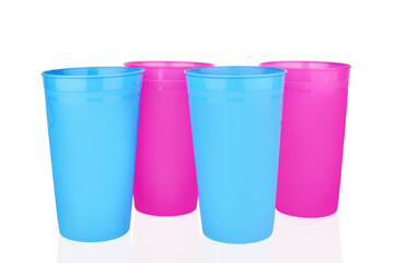 Blue pink empty plastic cups white background isolated close up, four disposable blank drinking glasses, party beverage, cocktail, water, coffee mug, tea, fruit juice, tumbler design, picnic utensil