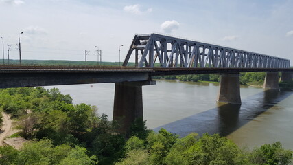 view  from The Anghel Saligny Bridge (formerly King Carol I Bridge) spans the Danube near Cernavoda, Romania. may , 2017
