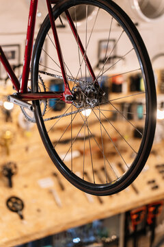Bicycle wheels on rack in workshop