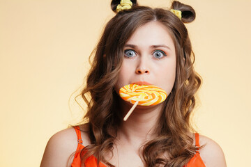 comic girl with round caramel caught red-handed on colored background, funny girl frightened with...