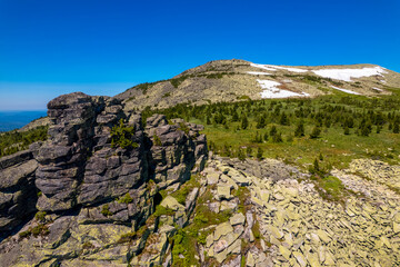 Sheregesh ski resort in summer, landscape on mountain Mustag, aerial top view Kemerovo region Russia