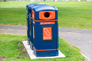 Fototapeta na wymiar A public rubbish or trash bin used for recycling plastic bottles