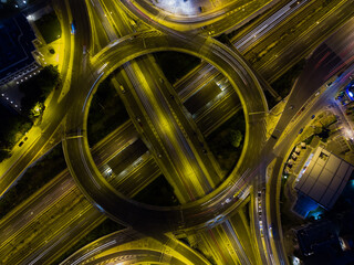 Car light trails at a traffic roundabout