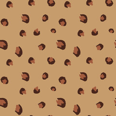 Leopard print, seamless vector illustration on brown background, hand drawn cheetah spot. Abstract pattern for fabric.