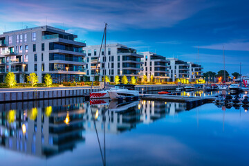 Yacht marina in Gdynia with modern architecture at dusk. Poland