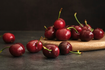 ripe cherries on a dark background
