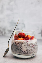 Dessert made of lactose-free milk with chia seeds and strawberries