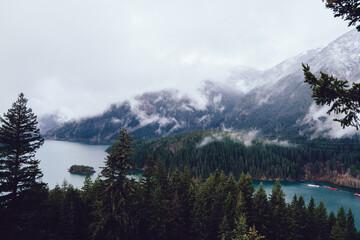 Calm lake reflecting in mountainous terrain