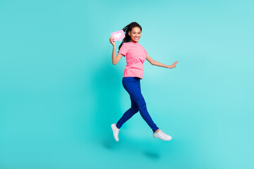 Fototapeta na wymiar Full body profile photo of sweet brunette hairdo young lady jump hold like wear t-shirt jeans isolated on teal color background